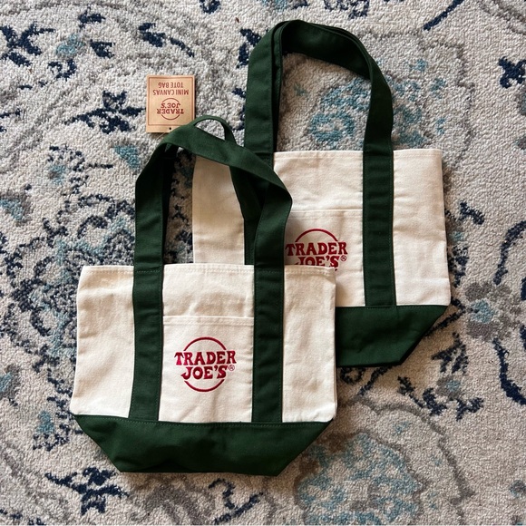 Trader Joe'S Handbags - Trader Joe’s collectible Green and Cream Canvas Tote Bag